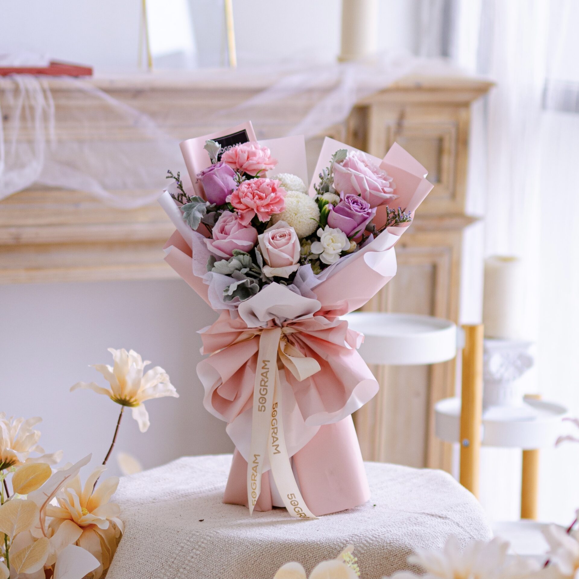 Soulmate – pink carnation bouquet – (r) | hand bouquet