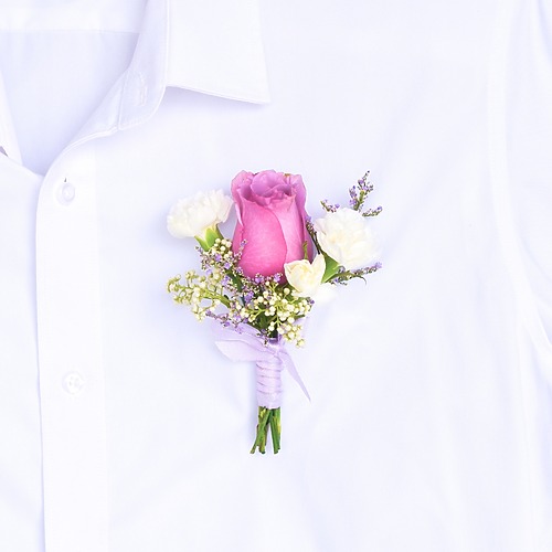 Sacred promise boutonniere