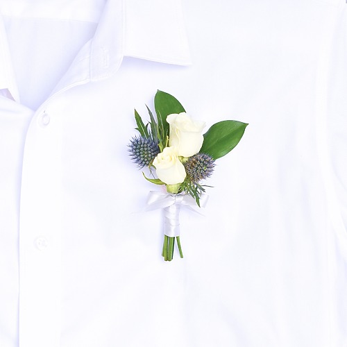 Unity in bloom boutonniere